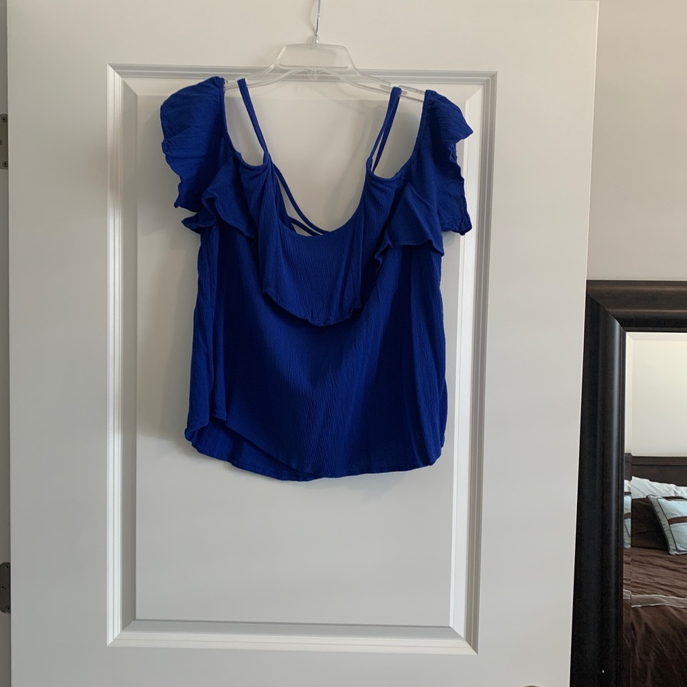 Gorgeous royal blue cold shoulder top with ruffle detail